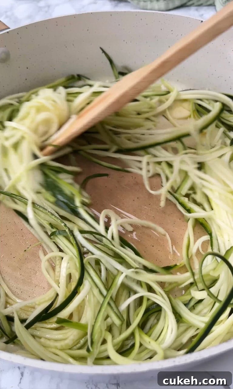 frying courgettes in olive oil.