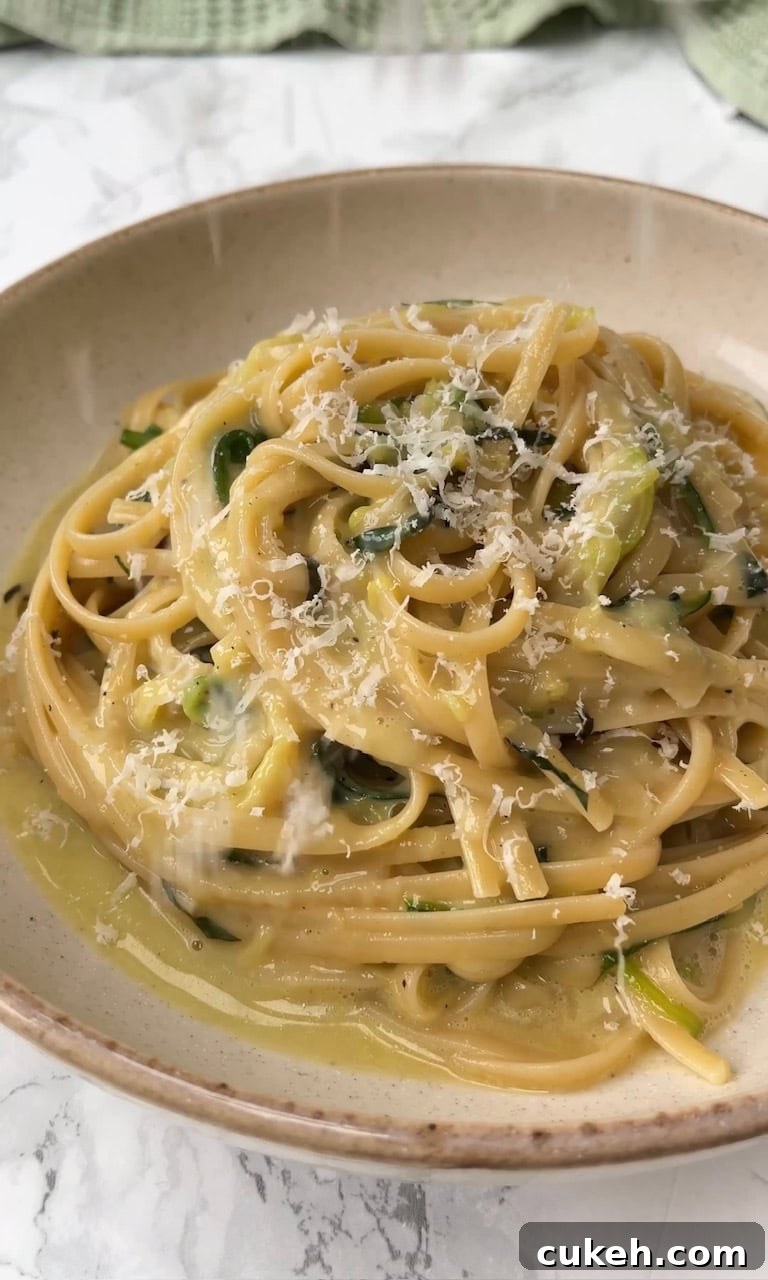 grating pecorino on courgette carbonara.